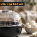 DASH Deluxe Egg Cooker Review: Is This Still the Best Egg Cooker for Busy Mornings? (2026) DASH Deluxe egg cooker review - black 12-egg cooker with clear dome lid and peeled eggs